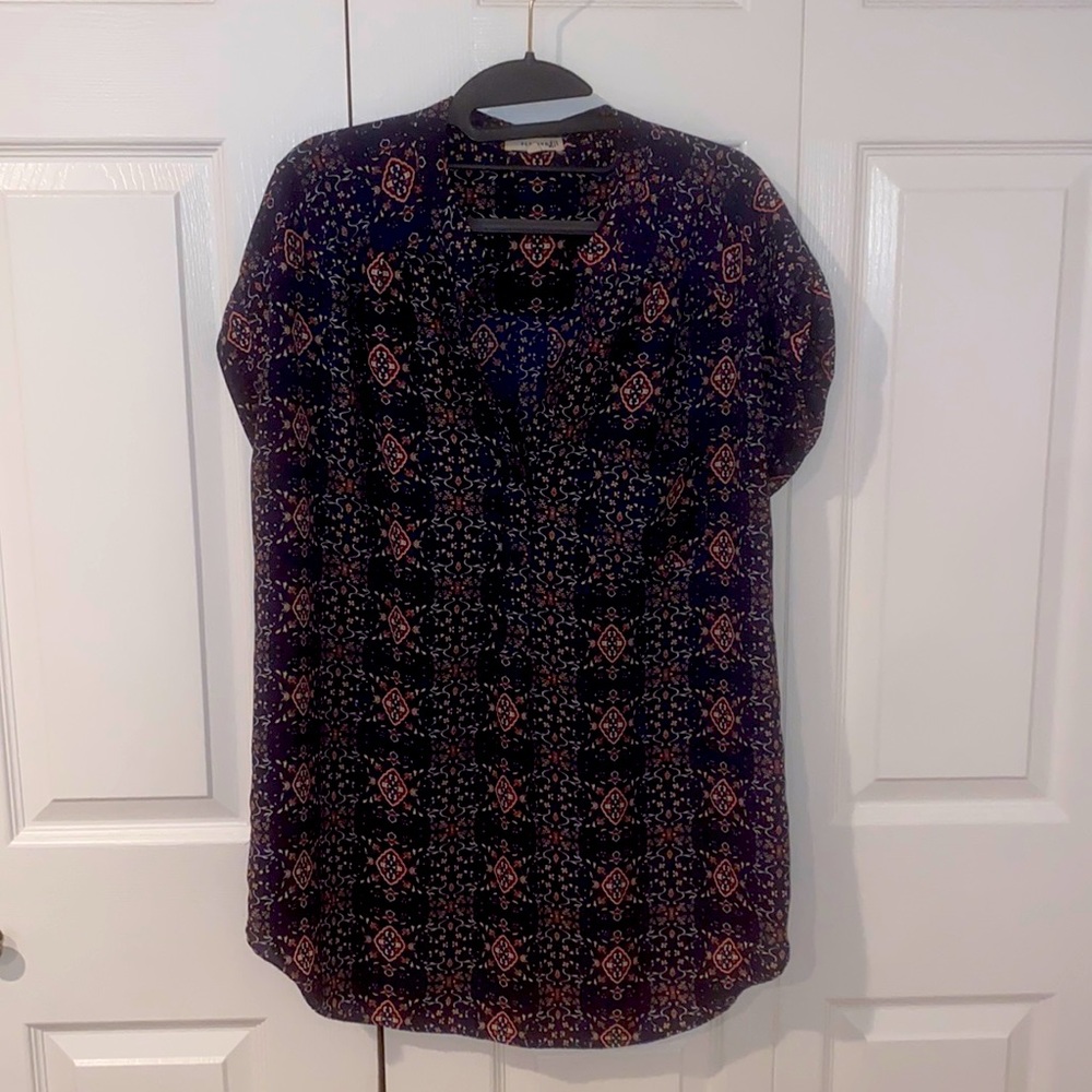 Pleione short sleeve tunic length blouse..